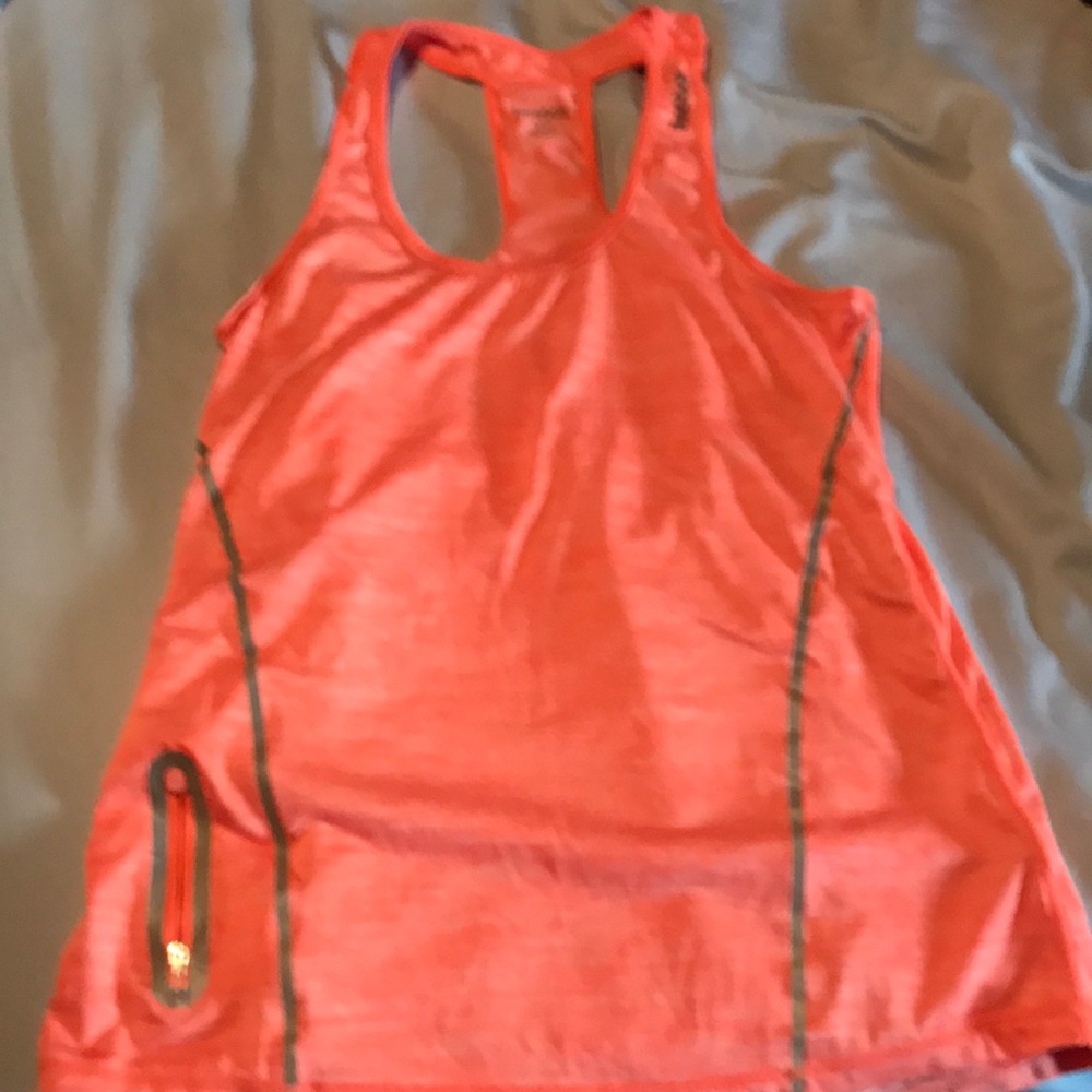 Bright orange Reebok tank